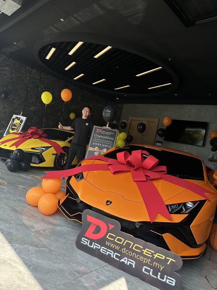 Orange Lamborghini handover at the D'Concept Supercar Club showroom